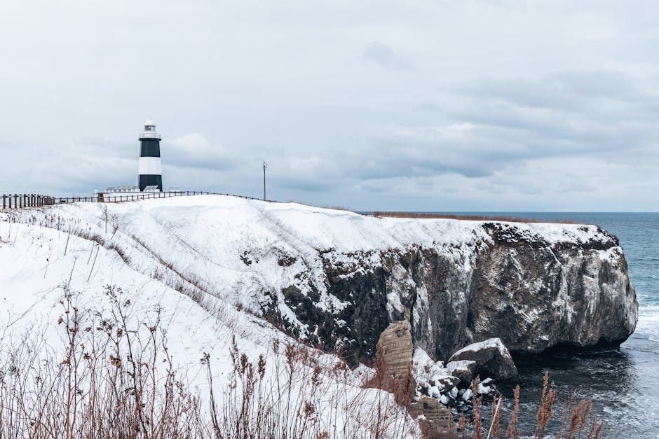 Lighthouse on snow-covered cliffs in Abashiri Hokkaido Japan