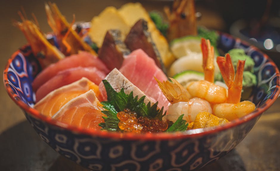 Colorful chirashi bowl with fresh seafood and garnishes