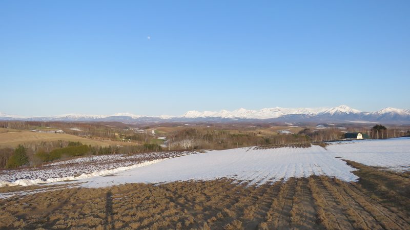 The Daisetsuzan Volcanic Group, part of Daisetsuzan National Park, Hokkaido, Japan, seen from Woody Life, Kamifurano.