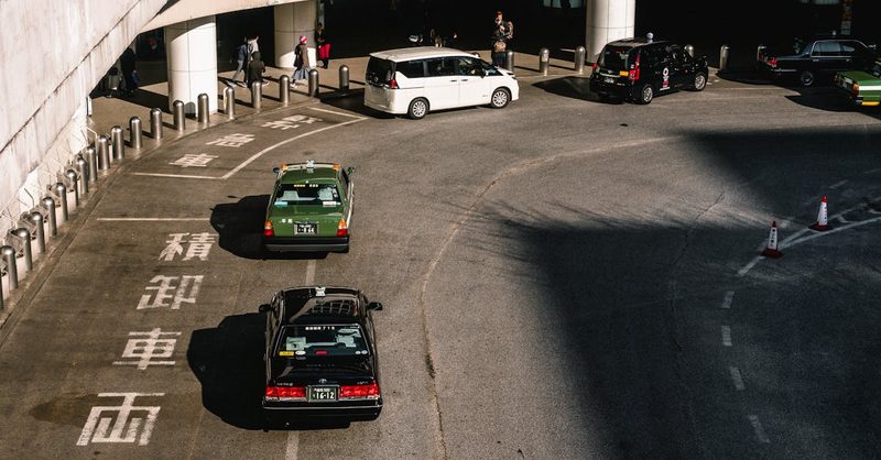 Rental car on scenic Hokkaido road