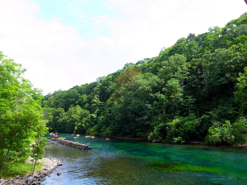 Kayaks on the clear waters of Lake Shikotsu, Hokkaido