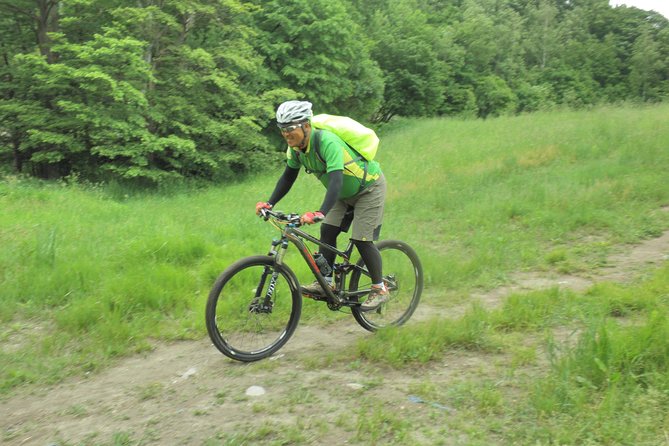 Nopporo Forest Mountain Bike Tour from Sapporo, presenting a retro Cycle cap - Meeting Jun and getting ready to ride