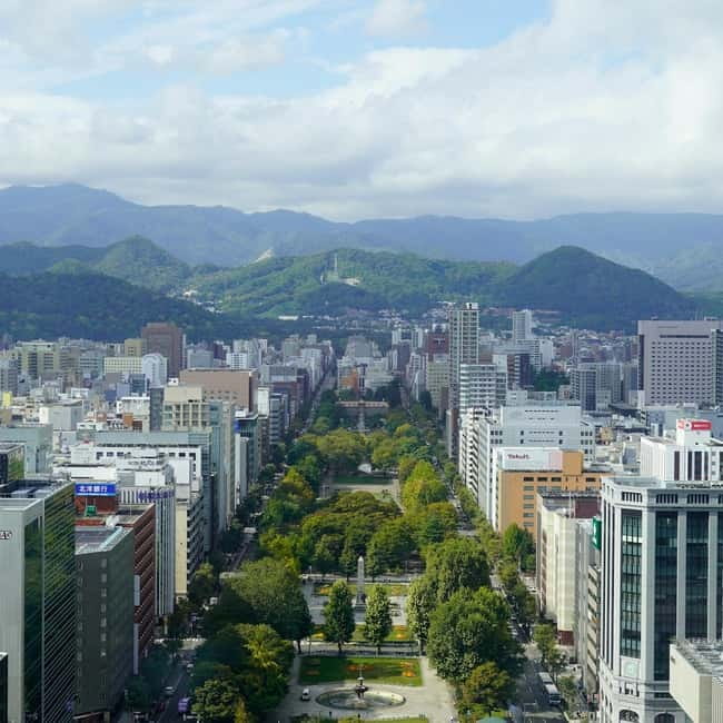 Sapporo Highlights: Golden Route Morning Guided Walking Tour - The Sapporo Clock Tower at 10:45