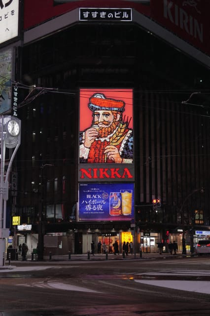 Sapporo: Nightlife Bar Hopping Tour with Local Guide - First stop: one included drink and local snacks