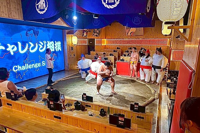 Sapporo Sumo Show Experience with Japanese Food and Photo - The framed photo and souvenir bag